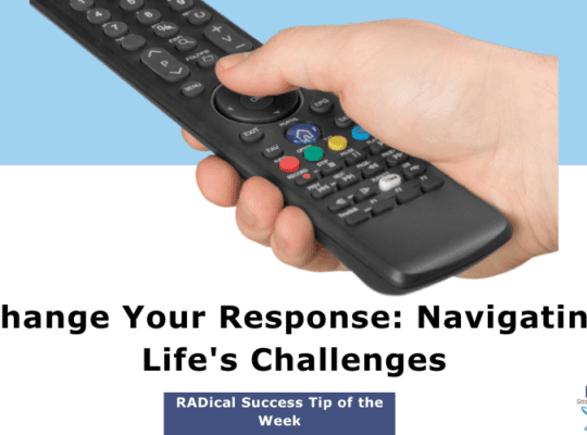 Remote control in focus symbolizing the power to change your response to life's challenges.